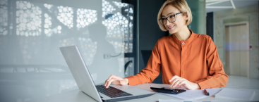 Woman uses laptop